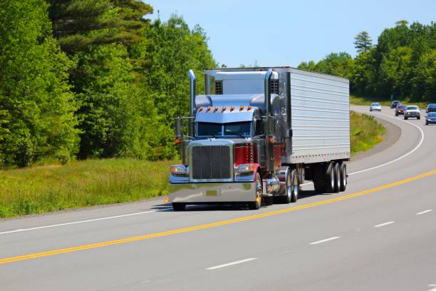 istock Semi truck on highway , traffic 641207830