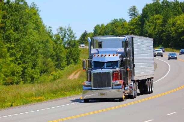 istock Semi truck on highway,traffic 641207914