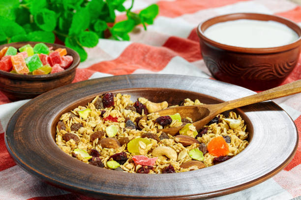 istock granola in clay plate on kitchen towel 641209270