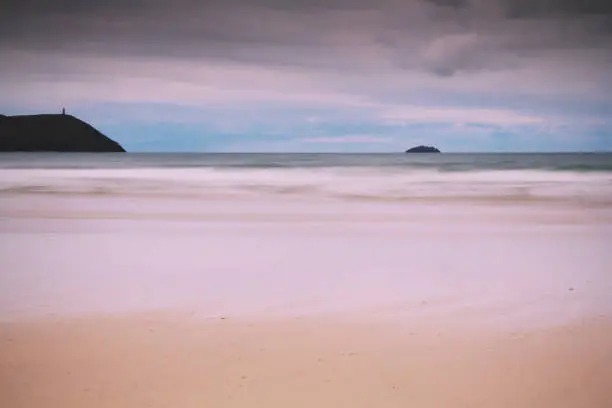 Photo of Early morning view of the beach at Polzeath Vintage Retro Filter.