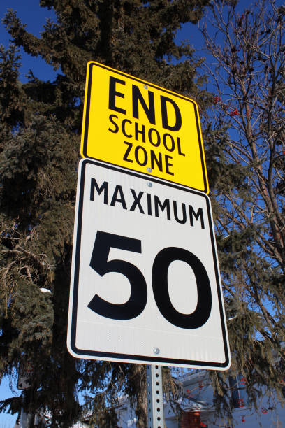 istock Speed Limit Sign at End of School Zone 641210036