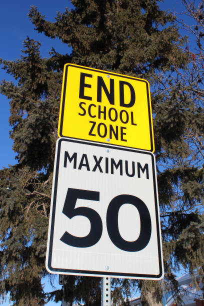 istock Speed Limit Sign at End of School Zone 641210218