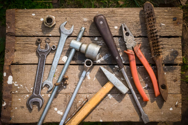 istock On weathered old wooden surface lie the tools 641212294