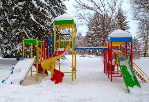 istock Children's playground covered with snow 641213916
