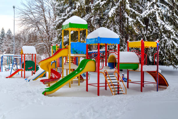 istock Children's playground covered with snow 641213920