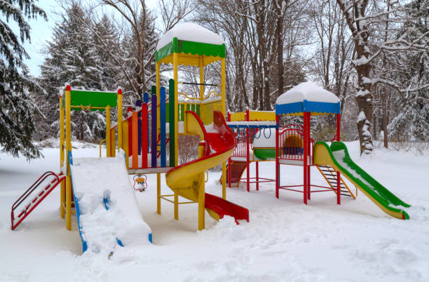 istock Children's playground covered with snow 641213944