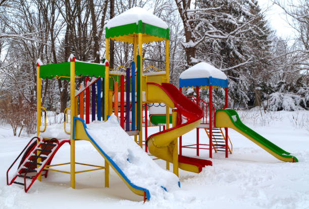 istock Children's playground covered with snow 641213984