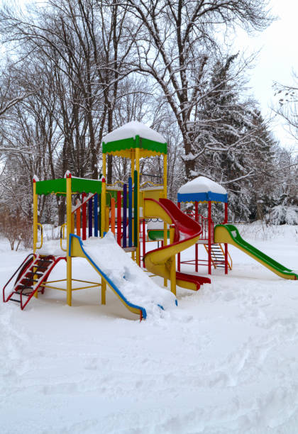 istock Children's playground covered with snow 641213992