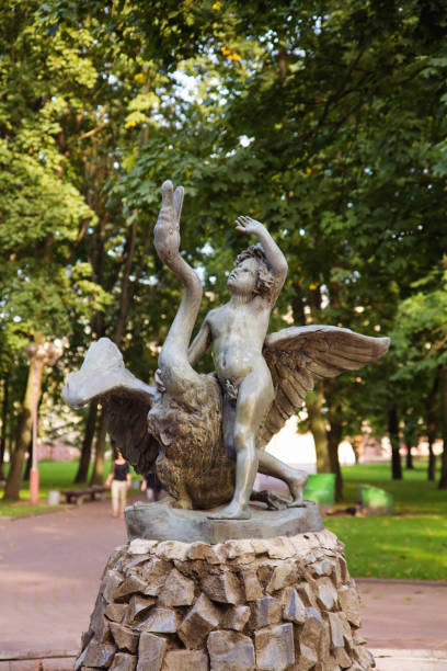 istock MINSK, BELARUS - SEPTEMBER 01, 2012: Boy and swan statue in park, Minsk. Belarus. 641214000