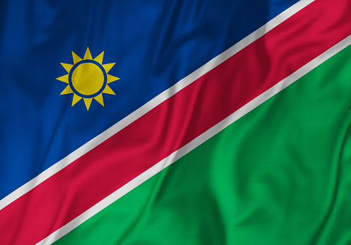 Closeup of Ruffled Namibia Flag, Namibia Flag Blowing in Wind