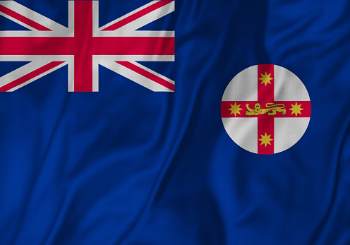 Closeup of Ruffled New South Wales Flag, New South Wales Flag Blowing in Wind