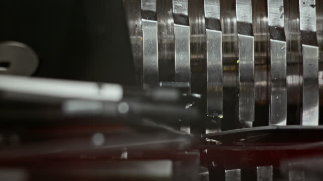 SLO MO Floppy discs being destroyed by industrial grinder