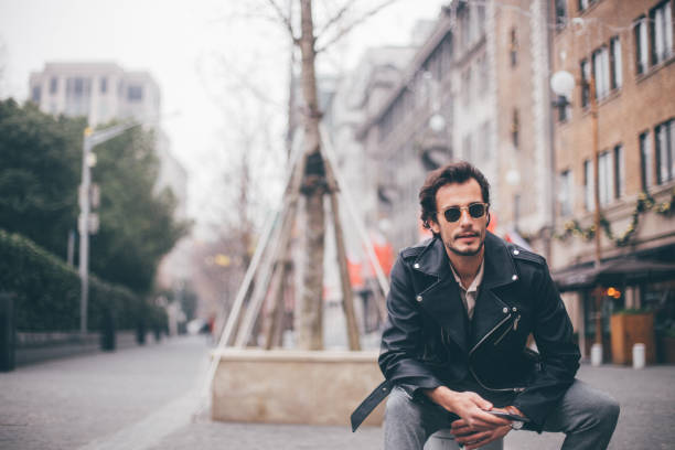 istock Man relaxing on the street 641223366
