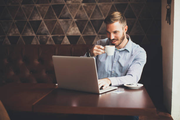 istock Young man sitting in cafe 641226402