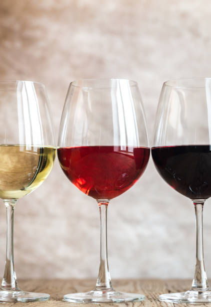 istock Glasses of red, rose and white wine 641228024