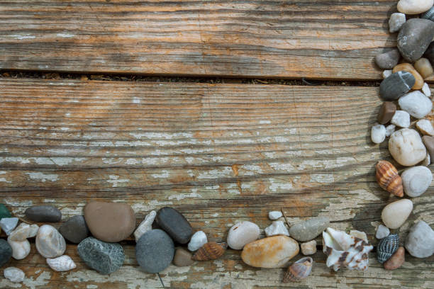 istock Sea stones on wooden background 641230886