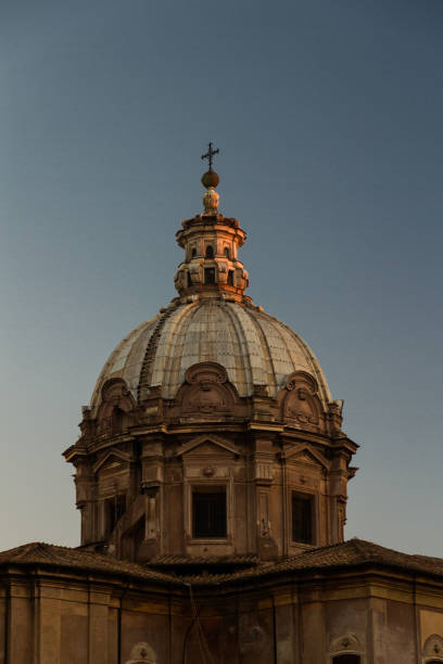 istock Church dome catching last light of day 641230956