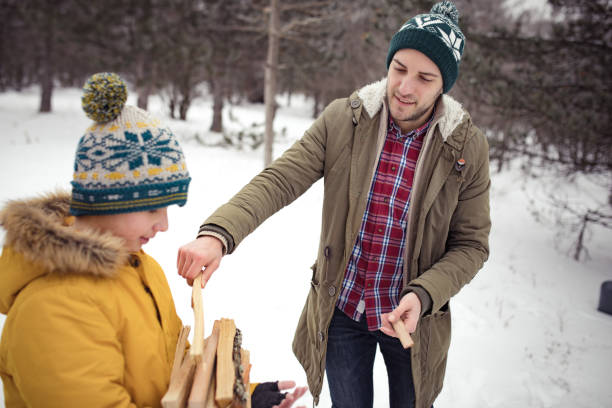 istock Father and son collecting firewood 641231048
