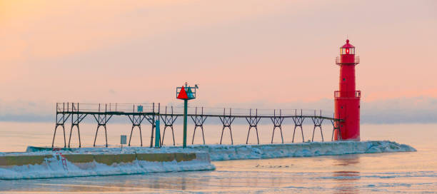 istock Panoramic twilight view of icy Lighthouse in January. 641232104