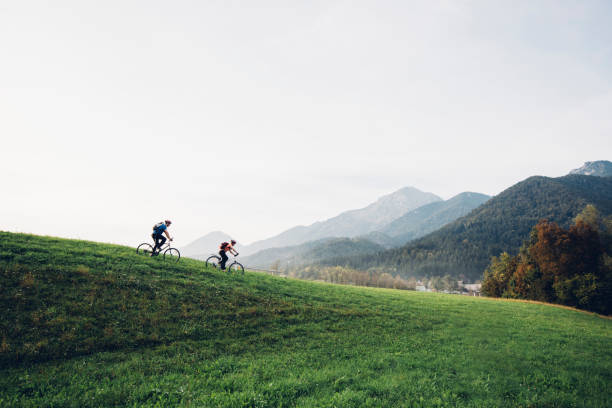 Cycling in mountains with panoramic view.