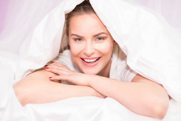 istock Beautiful young girl waking up. 641236592