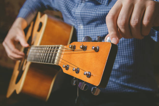 istock Close up of guitarist hand playing guitar 641236628