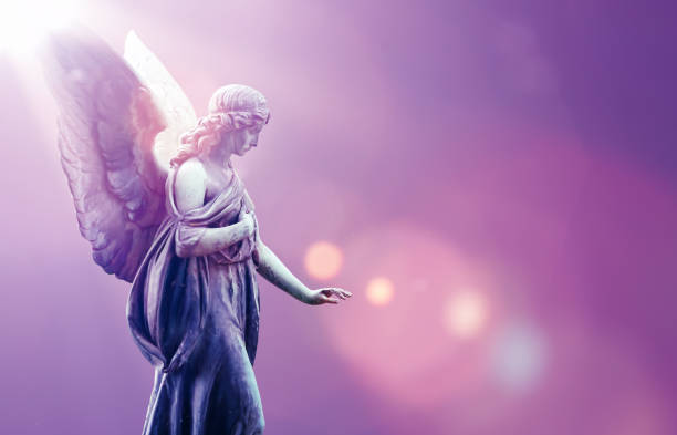 istock Angel in heaven over purple sky background 641237942
