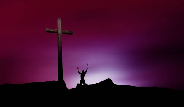 istock Dramatic sky scenery with cross and worshiper 641237964