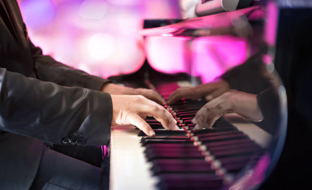 Pianist Playing Grand Piano Jazz Or Blues Music Background pianist stock pictures, royalty-free photos & images