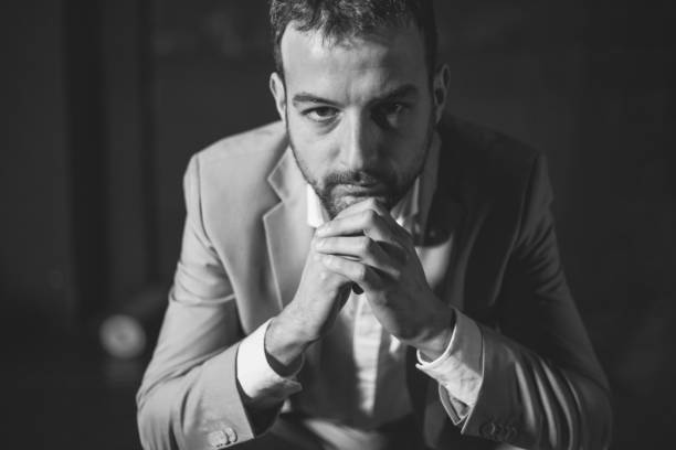 istock Portrait of young elegant handsome man in suit 641239892