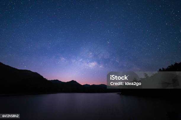 Peaceful Starry Night Sky On The River Landscape Background Stock Photo - Download Image Now