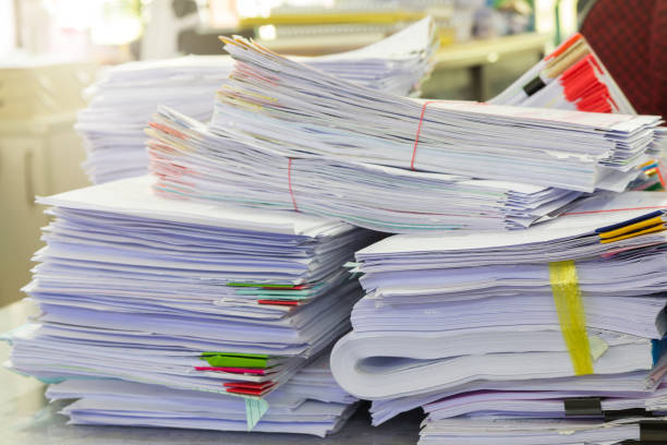 istock Business Concept, Pile of unfinished documents on office desk 641247118
