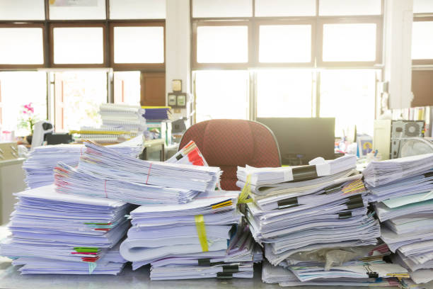istock Business Concept, Pile of unfinished documents on office desk 641247168