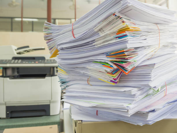 istock Business Concept, Pile of unfinished documents on office desk 641247178