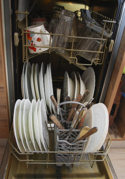istock Dishes and cutlery in the dishwasher. 641249544