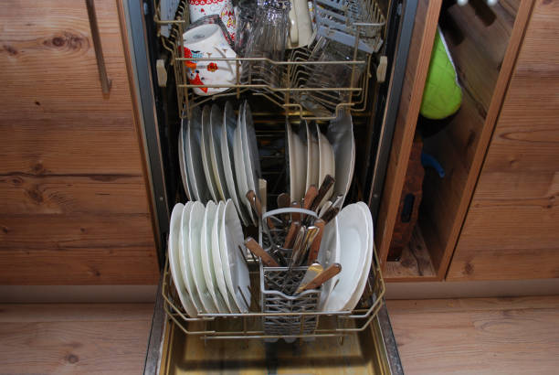 istock Dishes and cutlery in the dishwasher. 641249618