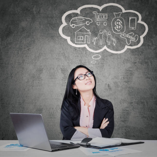 istock Businesswoman with her dream on a bubble cloud 641251498