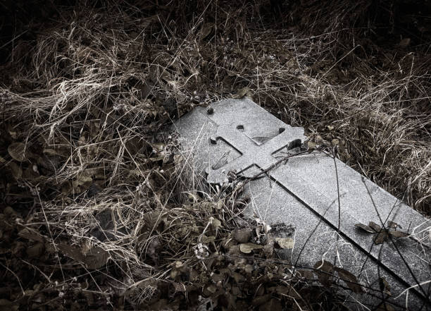 istock Brompton, London - Creepy gravestone with medieval cross engraving 641251976