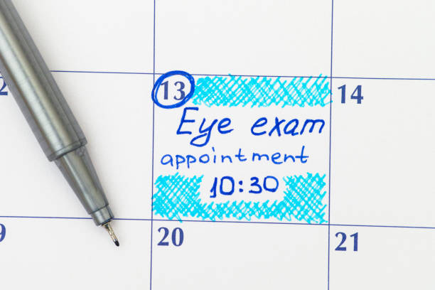 Reminder Eye exam appointment in calendar with pen Reminder Eye exam appointment 10-30 in calendar with pen. number 10 stock pictures, royalty-free photos & images