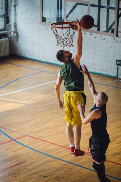 istock Group of friends playing basketball 641255620