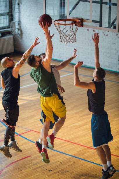 istock Group of friends playing basketball 641255696