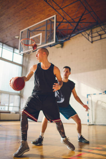 istock Group of friends playing basketball 641256048
