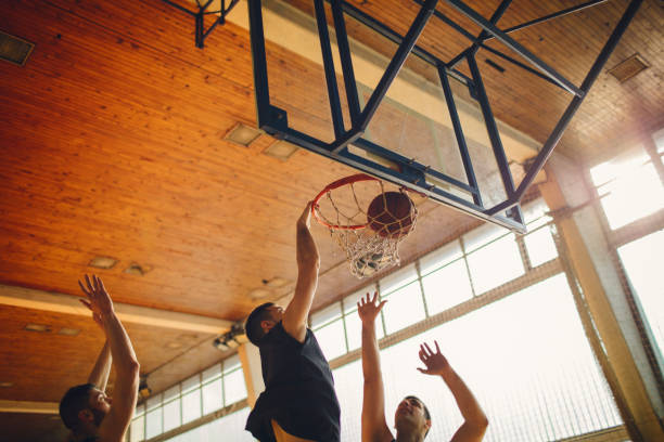 istock Group of friends playing basketball 641256260