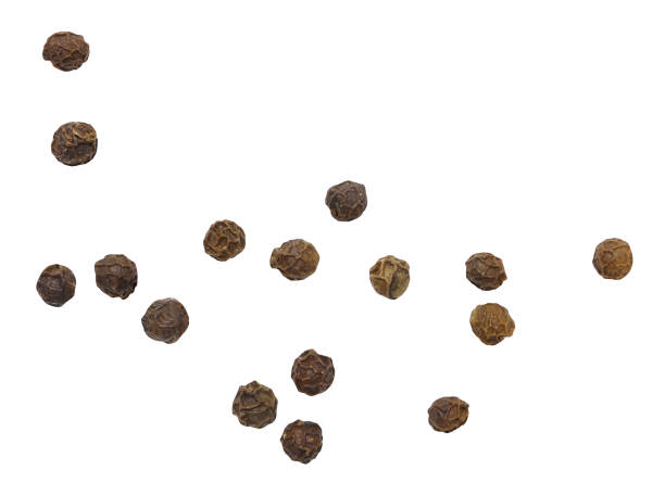 istock black pepper in bulk isolated on white background with clipping path 641257396