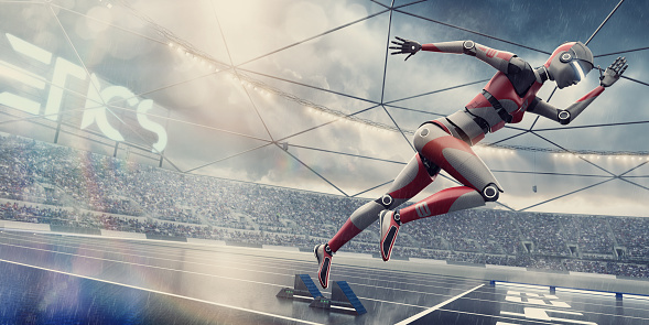 A futuristic conceptual image of a red and grey female cyborg in mid air, bursting out from the starting blocks on an outdoor racetrack. The robot is sprinting from the start line, and running alone in a floodlit generic athletics stadium under a stormy sky in light rain.