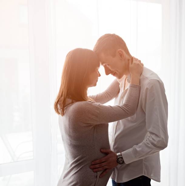 istock Pregnant woman with her husband 641261980