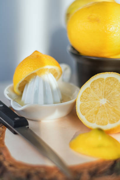 istock sliced lemon on a wooden board. 641272638
