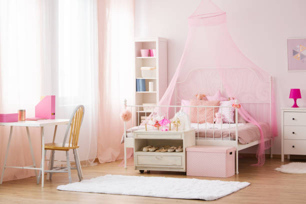 istock Girl bedroom with canopy bed 641272678