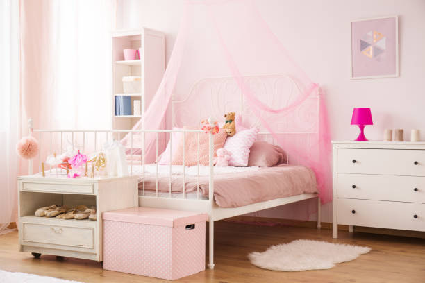 Cozy child bedroom in pink Cozy child bedroom in pink with canopy bed and dresser contemporary dance stock pictures, royalty-free photos & images