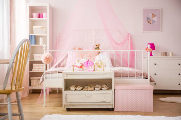 istock Pink bedroom with canopy bed 641272716